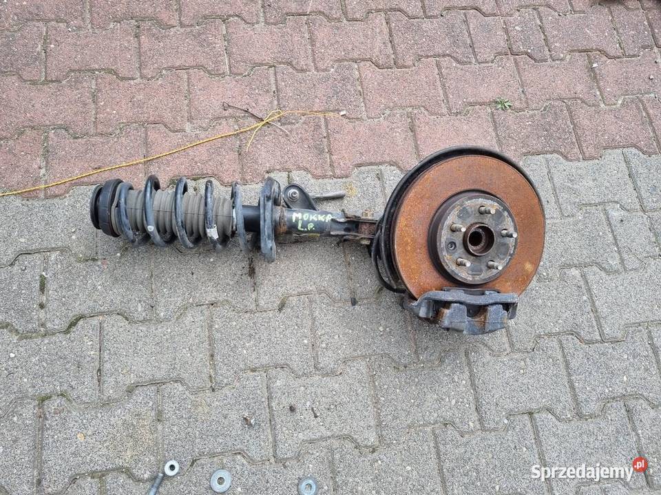 MCPERSON AMORTYZATOR SPRĘŻYNA LEWY PRZÓD OPEL osobowe