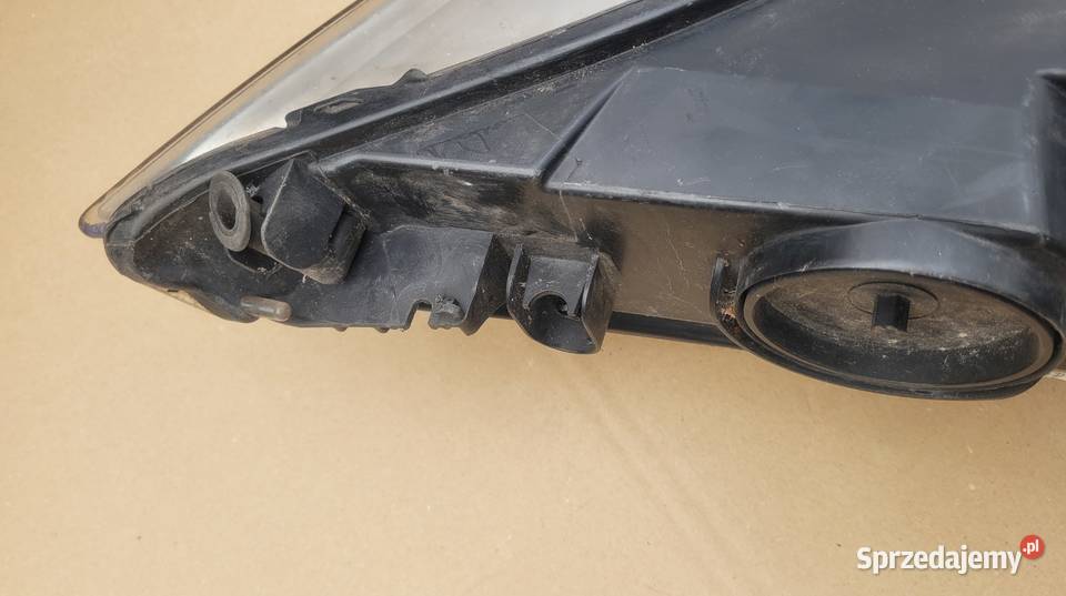 FORD MONDEO MK4 0710 REFLEKTOR LEWY LAMPA PRZÓD osobowe Ruda Śląska