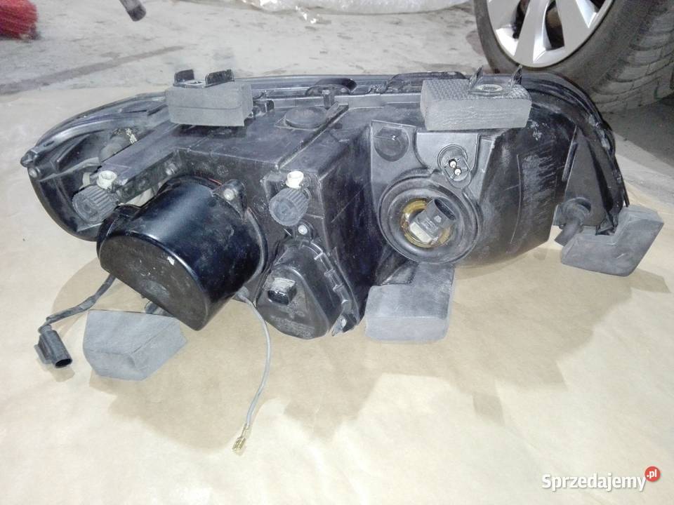 REFLEKTOR KSENON ŻARÓWKA LEWY PRZÓD BMW E53 Gdańsk