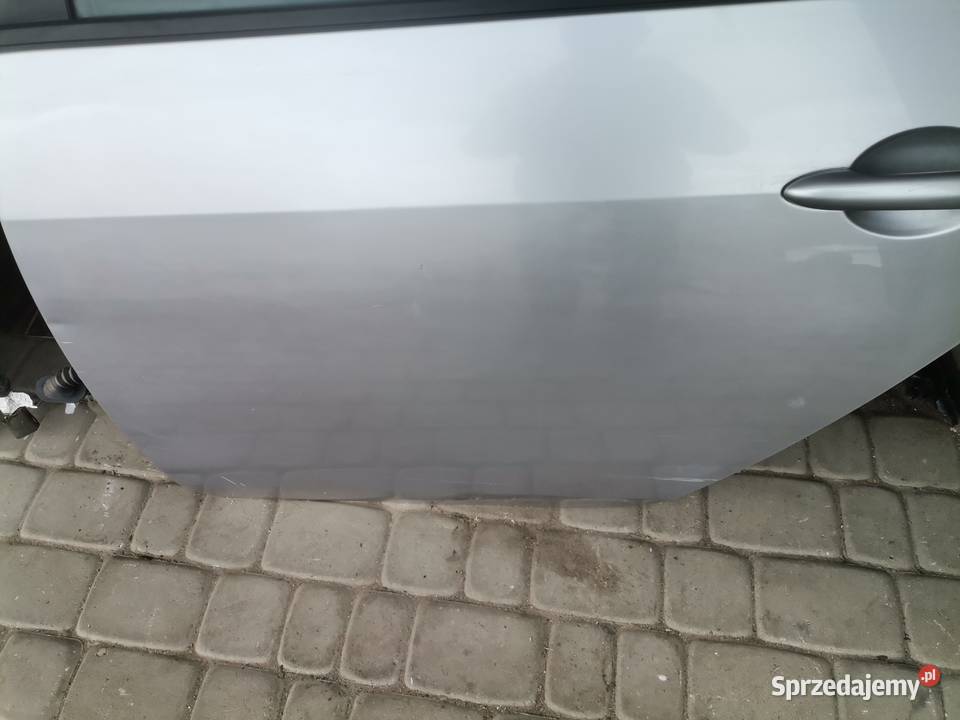 NISSAN PRIMERA P12 HB DRZWI LEWY TYŁ KY0G