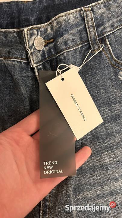 Spodnie jeansowe z przetarciami męskieunisex niebieski Spodnie
