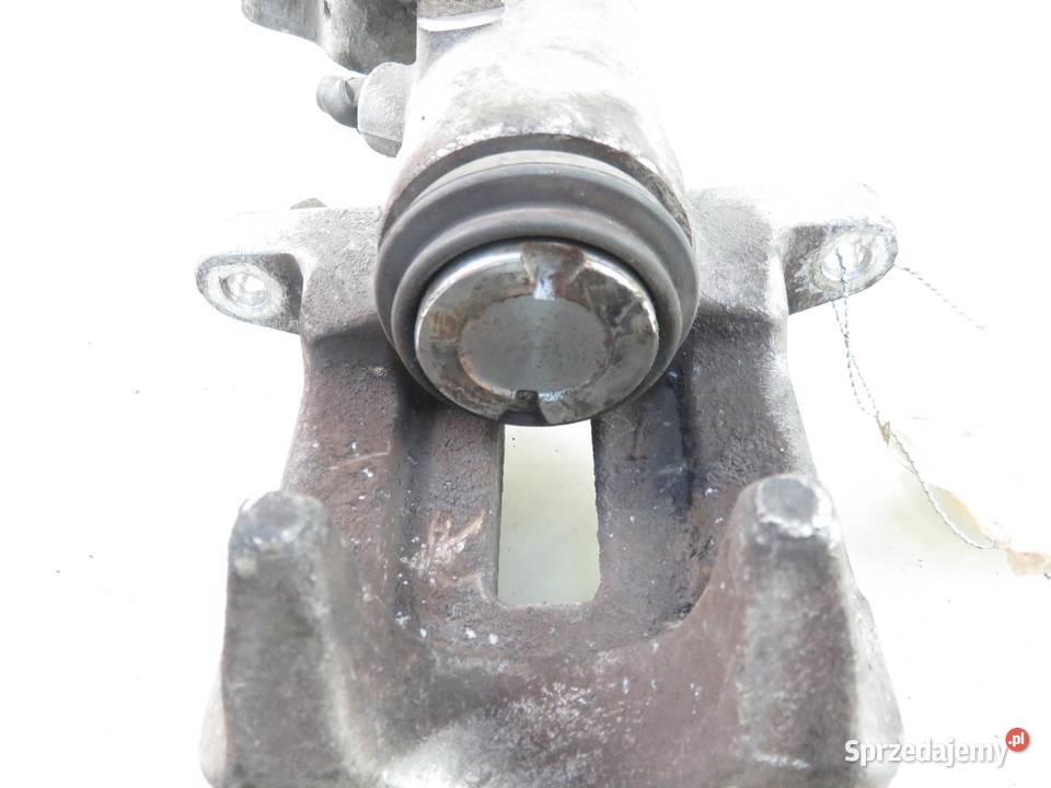 ZACISK LEWY TYŁ VW GOLF V 19 TDI