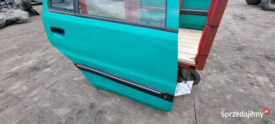 DRZWI PRAWE TYŁ PEUGEOT 106 osobowe kujawsko-pomorskie Lipno