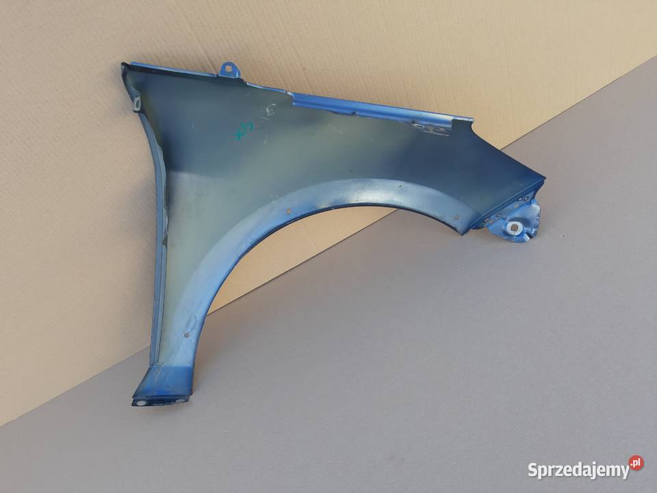 FORD FIESTA MK8 BŁOTNIK LEWY PRZÓD Trzciel
