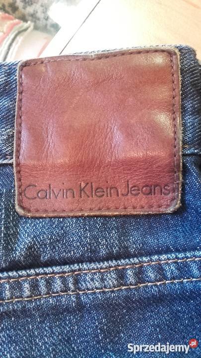 dzinsy Calvin Klein regular slim z dziurami