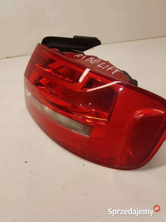 LAMPA PRAWY TYŁ W BŁOTNIK AUDI A4 B8 8K5945096AA Przystajń