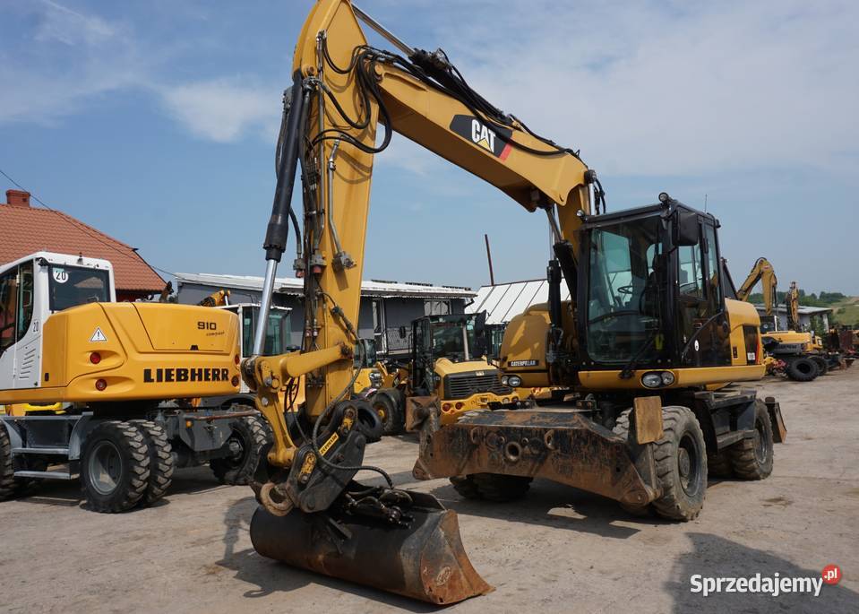 Koparka kołowa CAT M 313 D 2010 Jeziorko