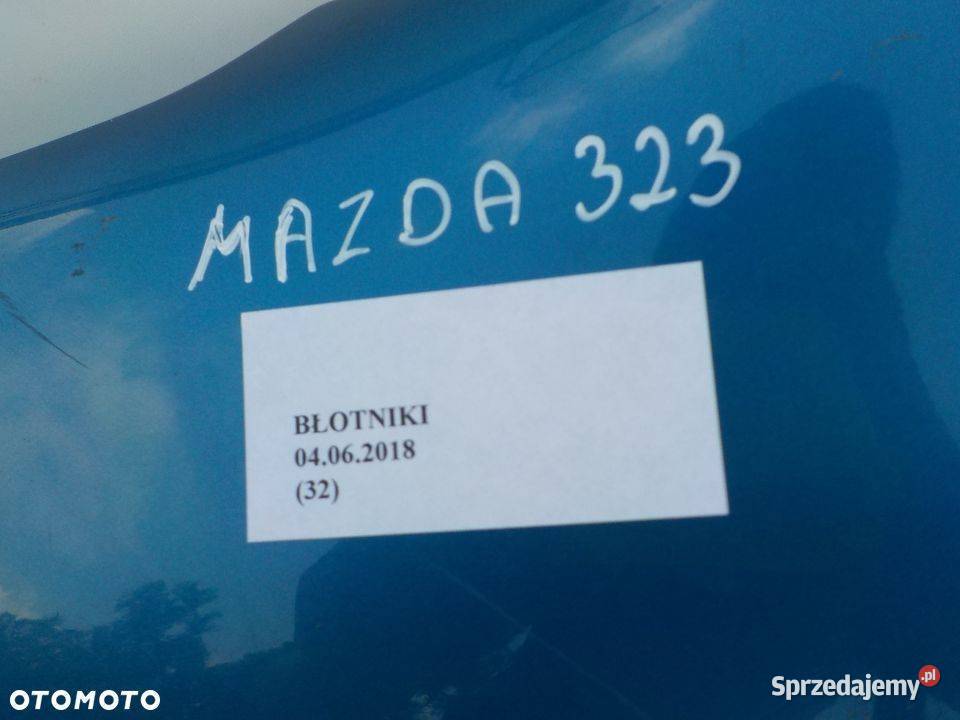 BŁOTNIK PRZEDNI LEWY MAZDA 323