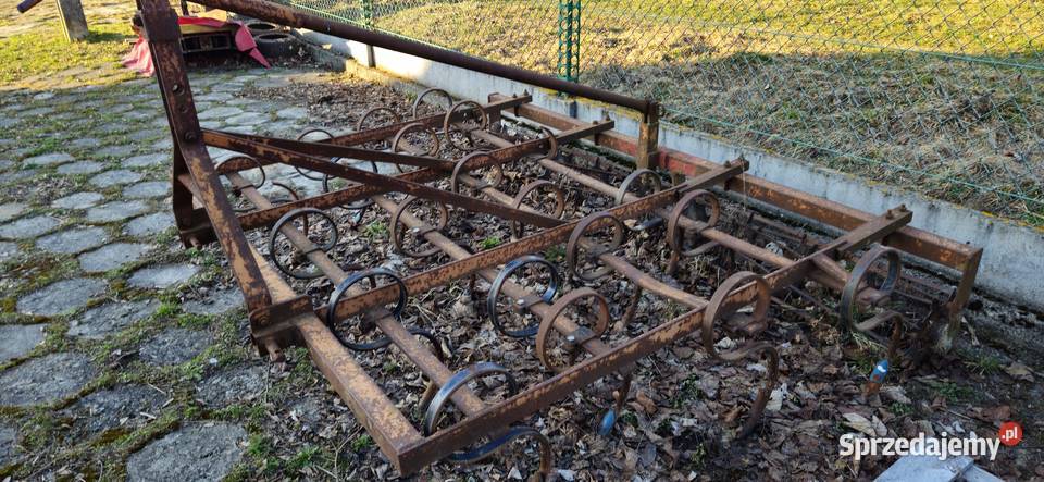 Kultywator 2 5m z tyłu z wałem strunowym