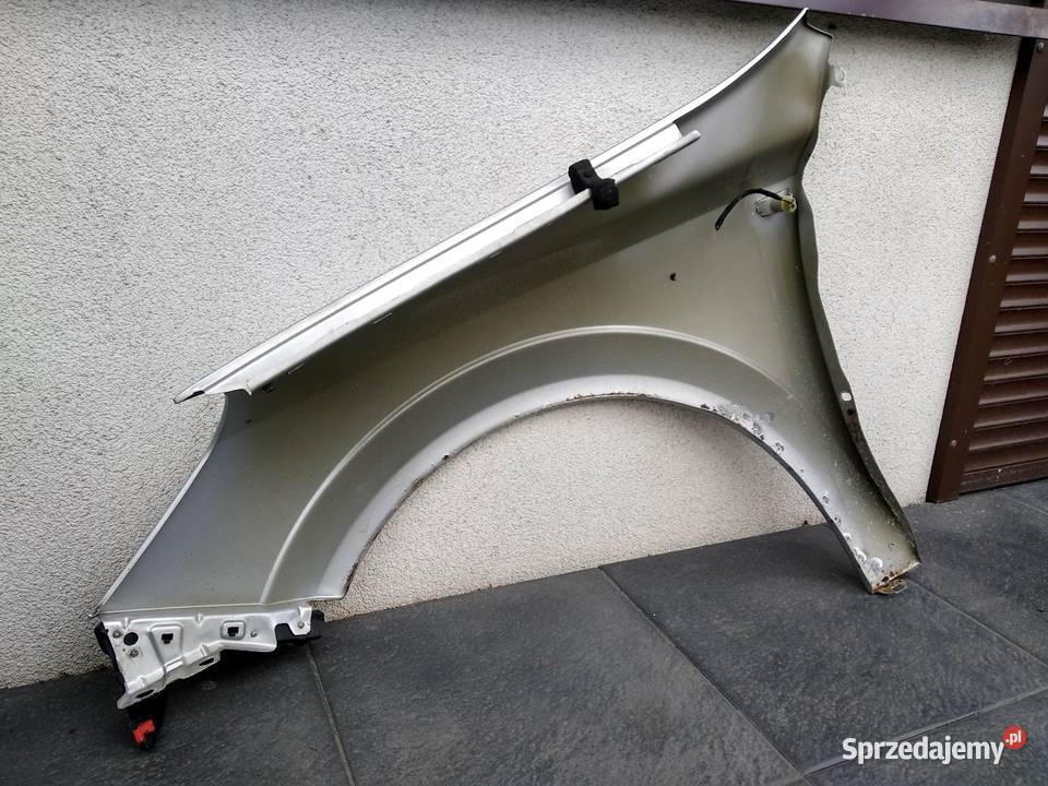 Opel Astra H błotnik przedni lewy srebrny Z157 Błotniki