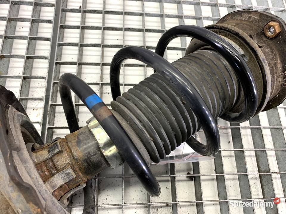 AMORTYZATOR LEWY PRZÓD ZE SPRĘŻYNĄ VW GOLF VII