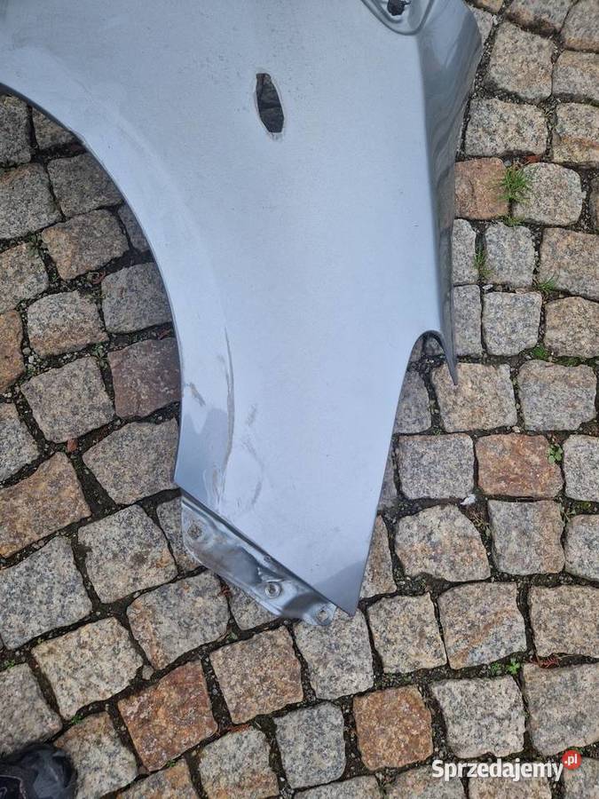 Błotnik prawy toyota yaris 1f8 Paczków