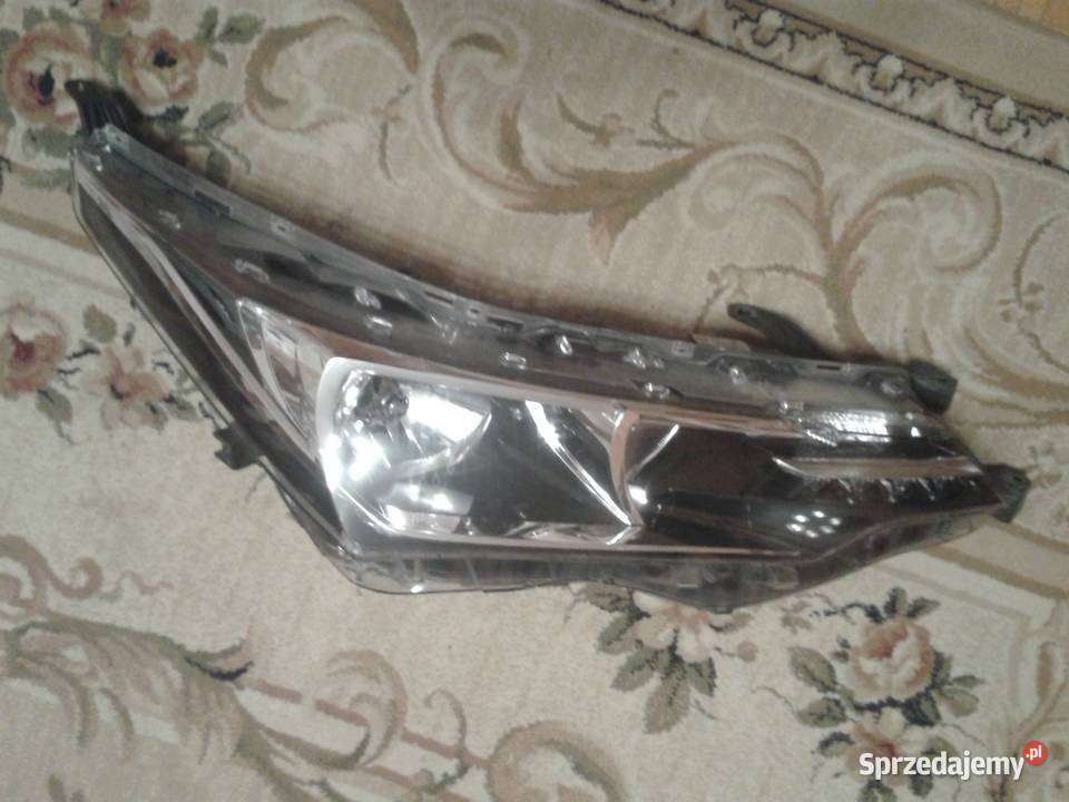 PRAWY REFLEKTOR TOYOTA COROLLA 8113002L50 lampy przednie Białystok
