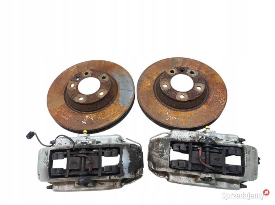 ZACISK HAMULCOWY PRAWY LEWY PRZÓD BREMBO TARCZE