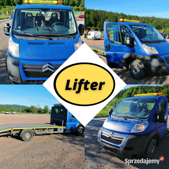 Zwyżka podnośnik koszowy nożycowy Genie prace na