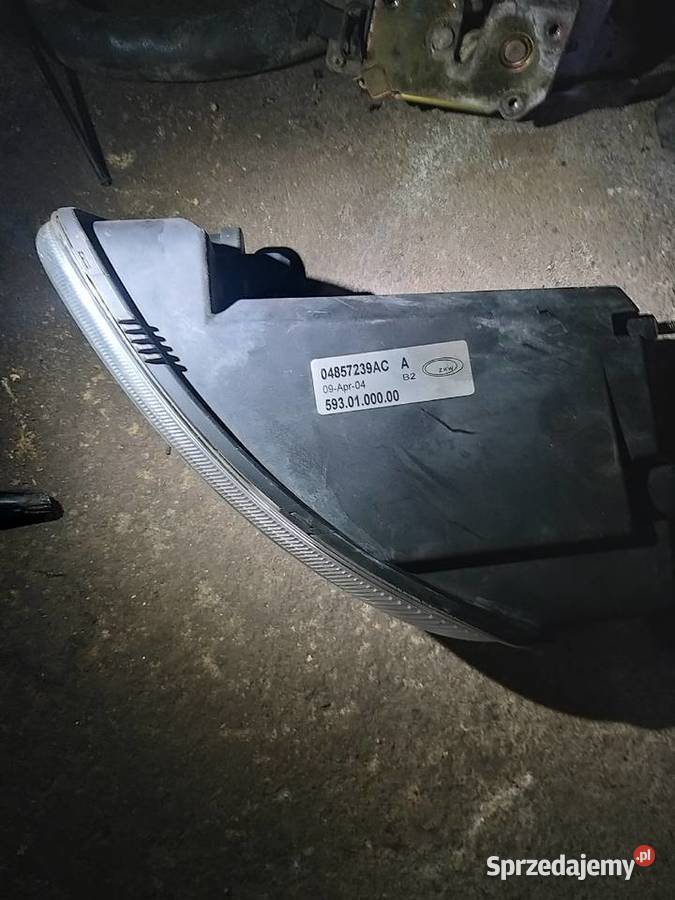 CHRYSLER TOWNCOUNTRYDODGE CARAVAN HALOGEN 0107 R Oświetlenie Kawnice sprzedam
