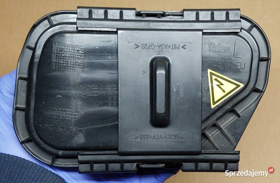 ZAŚLEPKA DEKIELEK LAMPY XENON LEWY PRZÓD AUDI Q7 osobowe Mielęcin