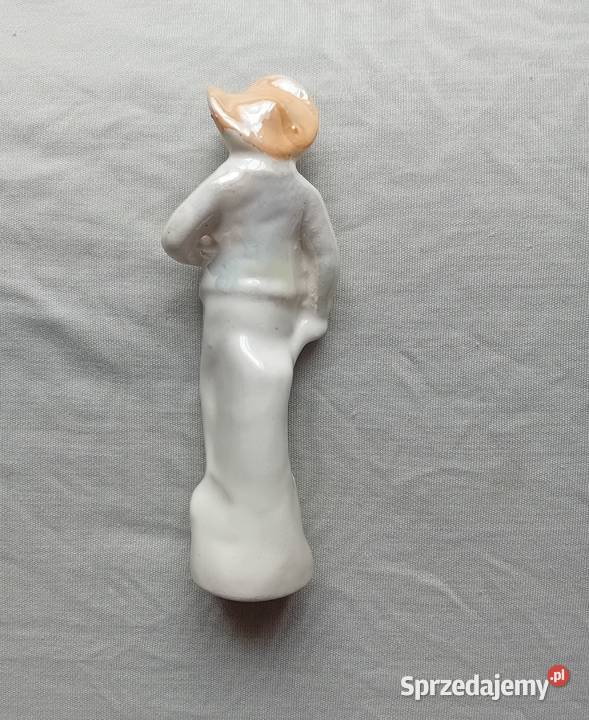 Porcelanowa figurka chłopak w kapeluszu strój z Koźminek sprzedam