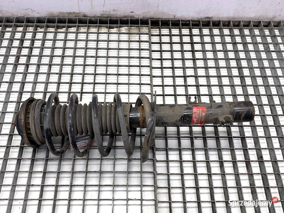 AMORTYZATOR LEWY PRZÓD ZE SPRĘŻYNĄ PEUGEOT 208 I