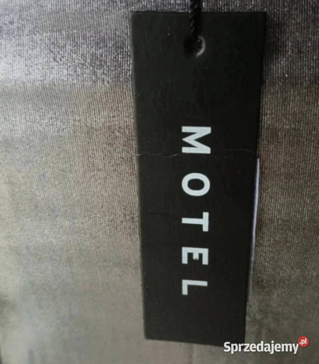 Elegancka sukienka srebna wyeksponowane plecy podkarpackie Krosno