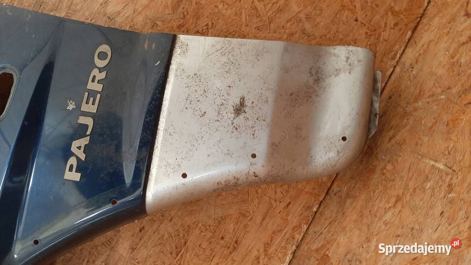 MITSUBISHI PAJERO III 99 BŁOTNIK LEWY PRZÓD osobowe Błotniki Nowy Tomyśl