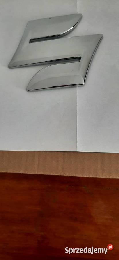 Emblemat SUZUKI 7781154GCOOPGOE Świechocin