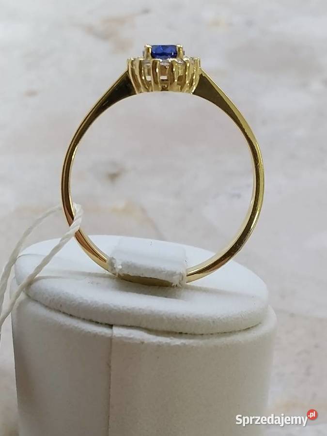 Złoty Nowy pierścionek z oczkiem koloru szafir i złote