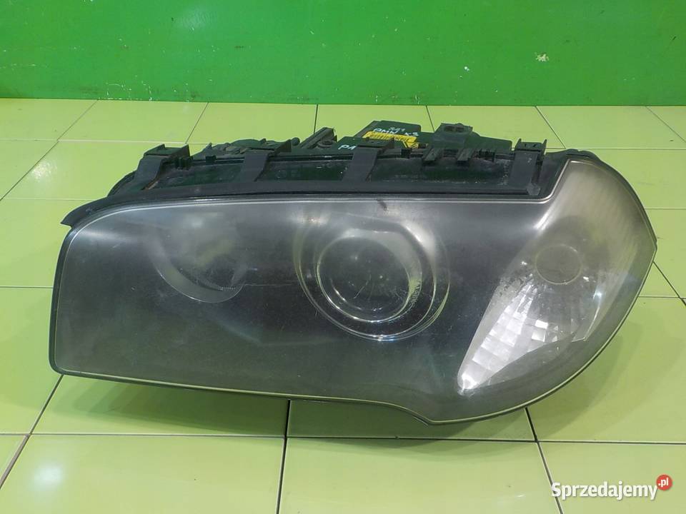 BMW X3 E83 30 B 04r 5D lampa lewa przod XENON Części samochodowe Suków