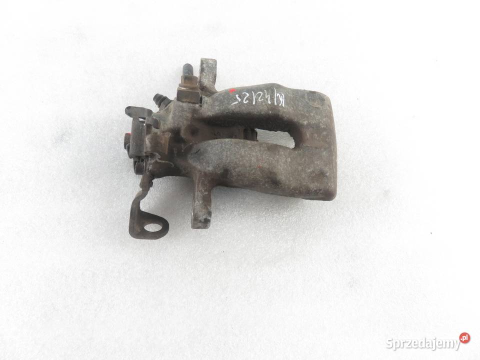ZACISK PRAWY TYŁ OPEL MERIVA A 16 16V 105 Z 16 Zaciski i jarzma