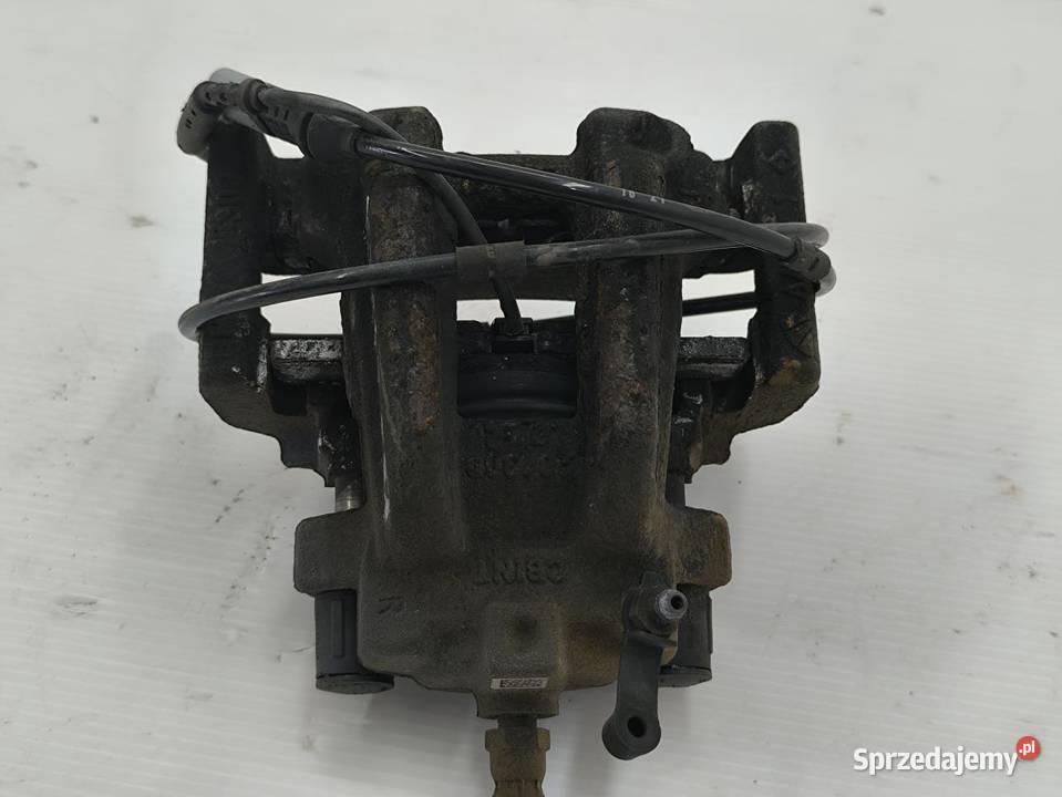 ZACISK PRAWY TYŁ BMW F31 20D LIFT wielkopolskie