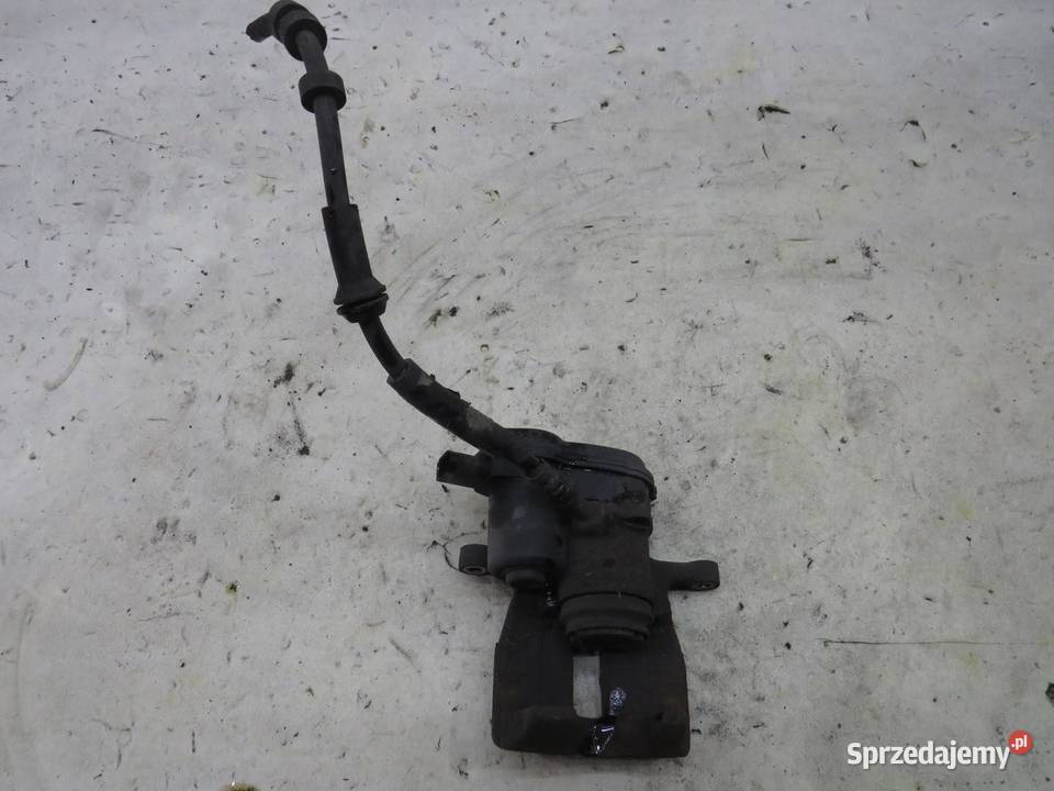 ZACISK HAMULCOWY PRAWY TYŁ AUDI Q5 8R 32 FSI