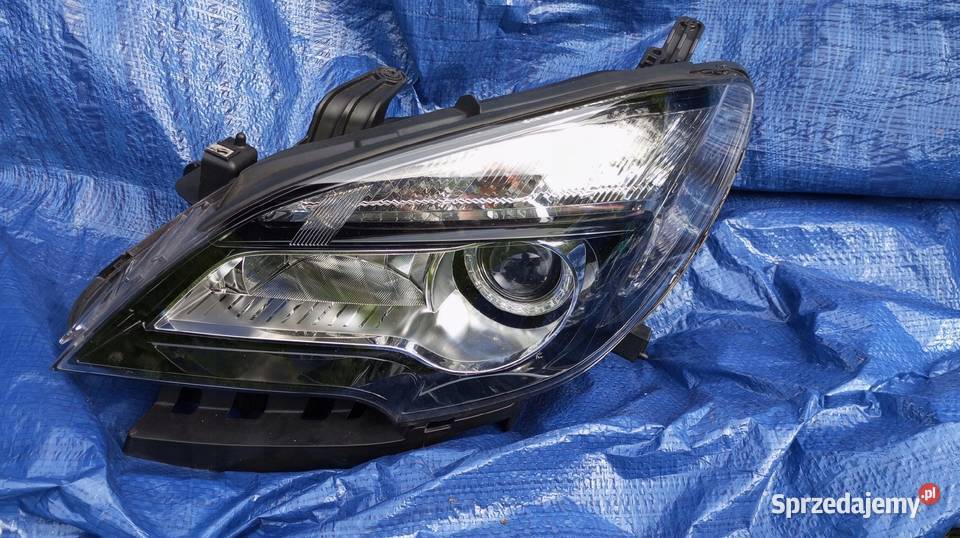 LAMPA REFLEKTOR LEWY PRZÓD EU XENON OPEL MOKKA I Lampy przednie Motoryzacja wielkopolskie Nowy Tomyśl