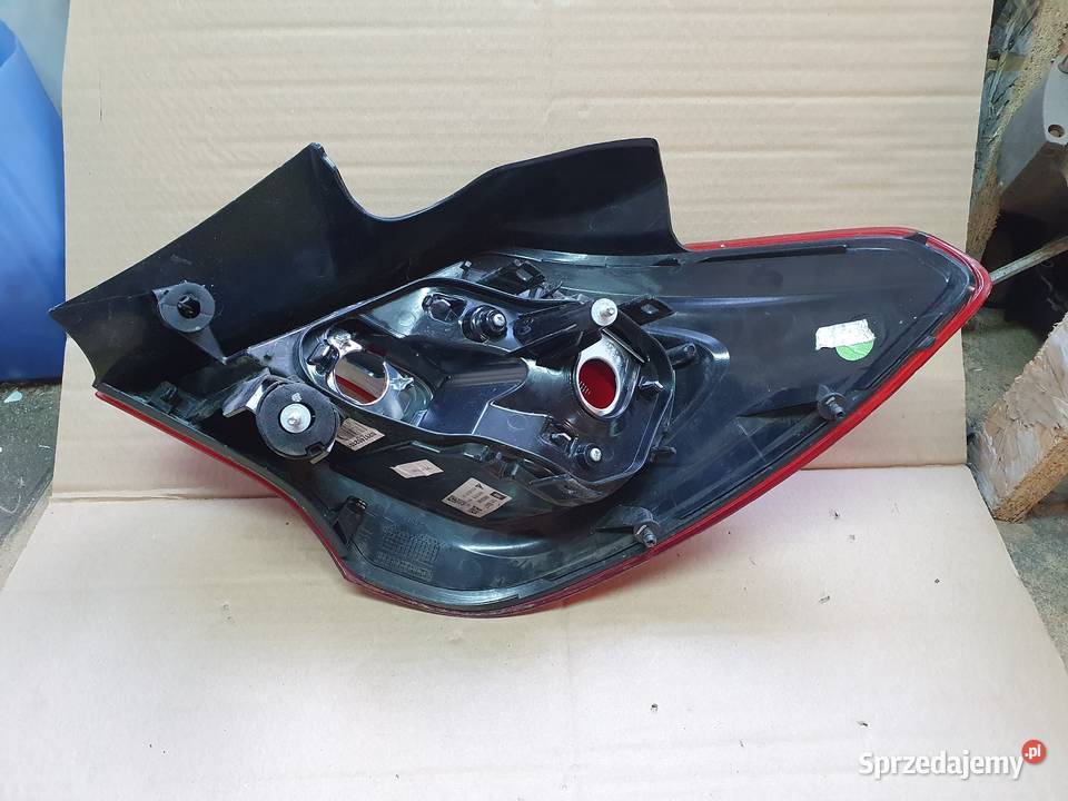 OPEL CORSA E LAMPA LEWA TYLNA LEWY TYŁ 13428447 Oświetlenie wielkopolskie