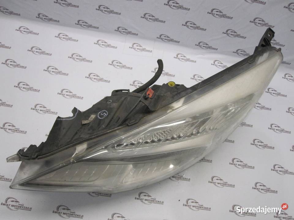 OPEL MERIVA B 13r lampa lewy przód 13253631 Lampy przednie