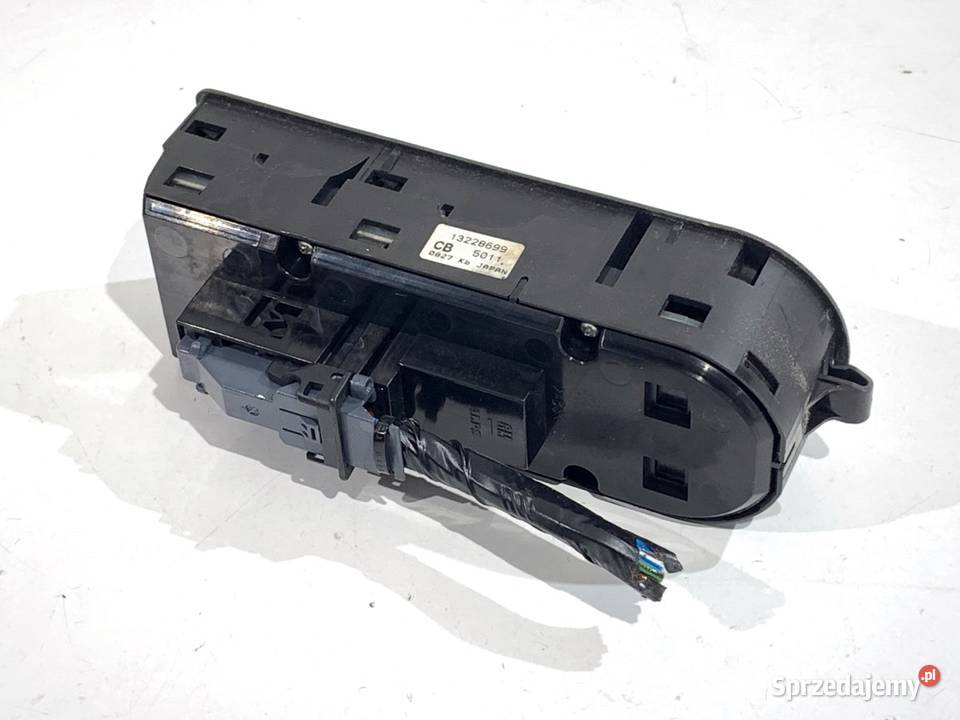PRZEŁĄCZNIK SZYB OPEL ASTRA H 13228699 0414 osobowe Mechanizmy opuszczania szyb