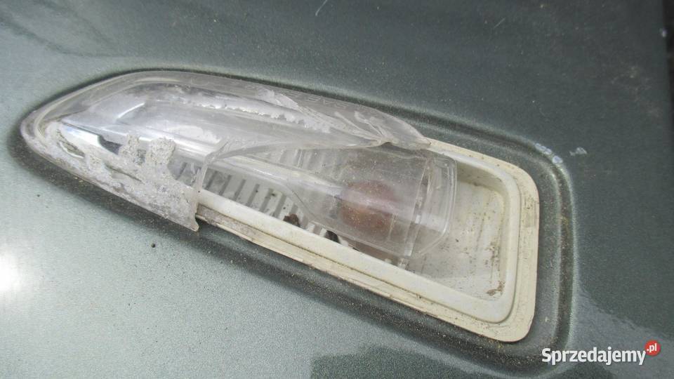 OPEL ASTRA J IV 10r błotnik prawy przód