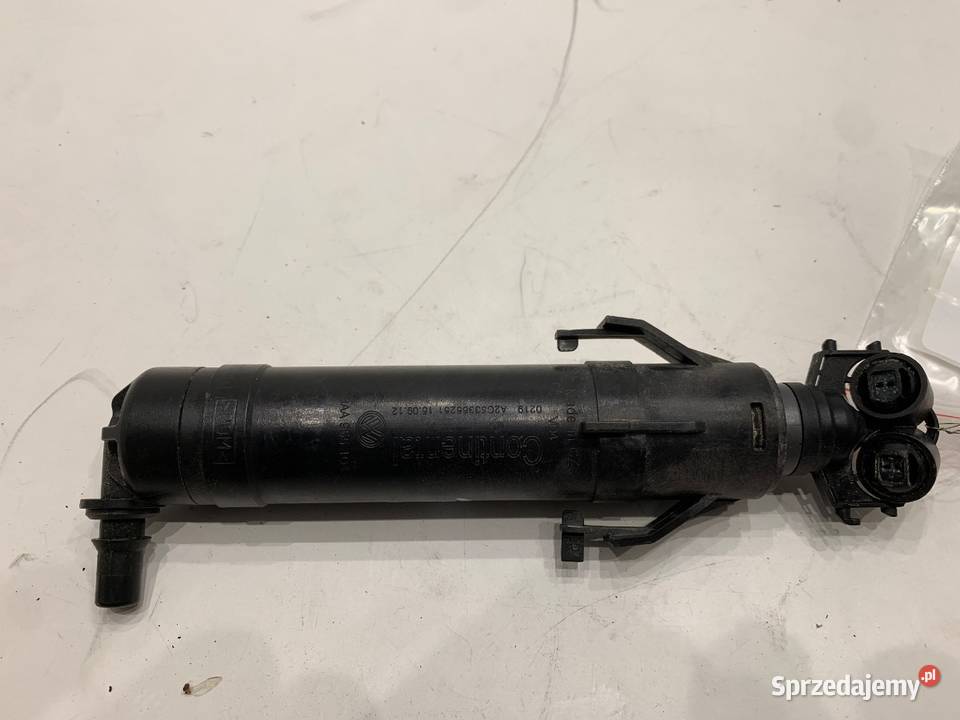 SPRYSKIWACZ REFLEKTORA PRAWY PRZÓD VW PASSAT B7