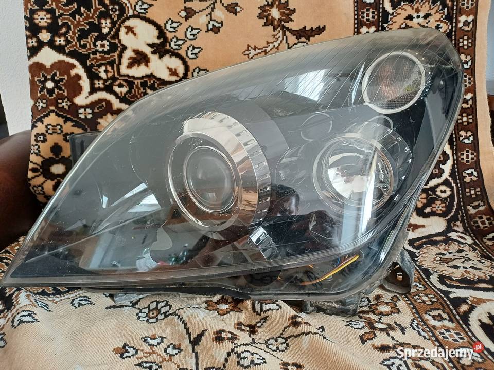 Lampa lewa opel astra h bixenon skrętna osobowe