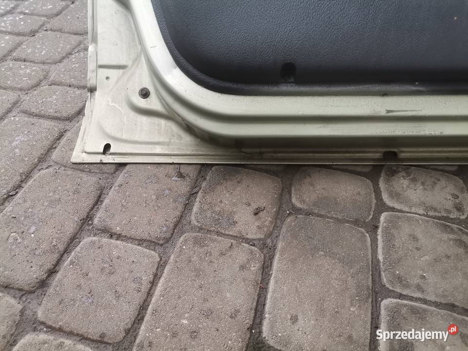 DRZWI LEWY PRZÓD RENAULT MEGANE 1 FL HB MV931 Nowy Sącz