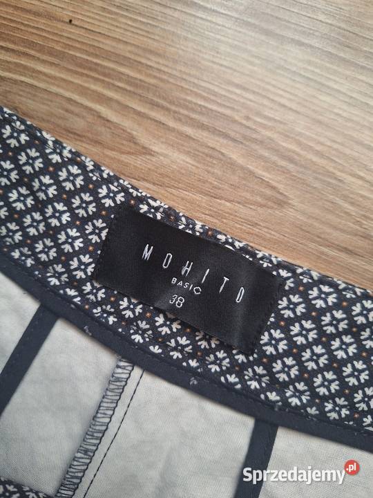 Świetne eleganckie spodnie Mohito z kieszeniami Kraków