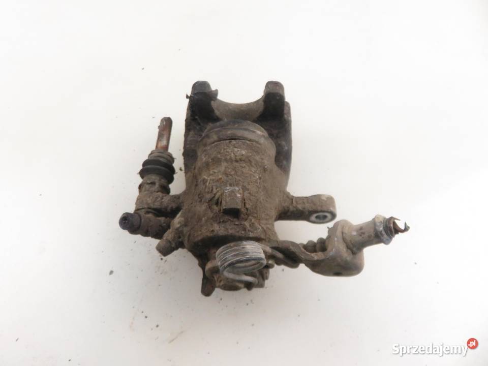 ZACISK LEWY TYŁ OPEL COMBO C 13 CDTI 16V Z 13 osobowe sprzedam