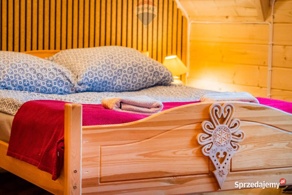 Działka zabudowana drewnianym domem w 100m2