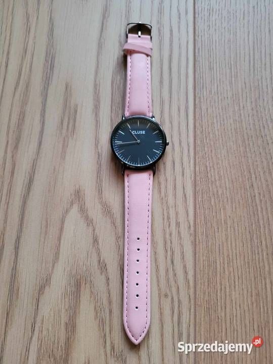 Różowy zegarek z czarną tarczą na pasku Warszawa