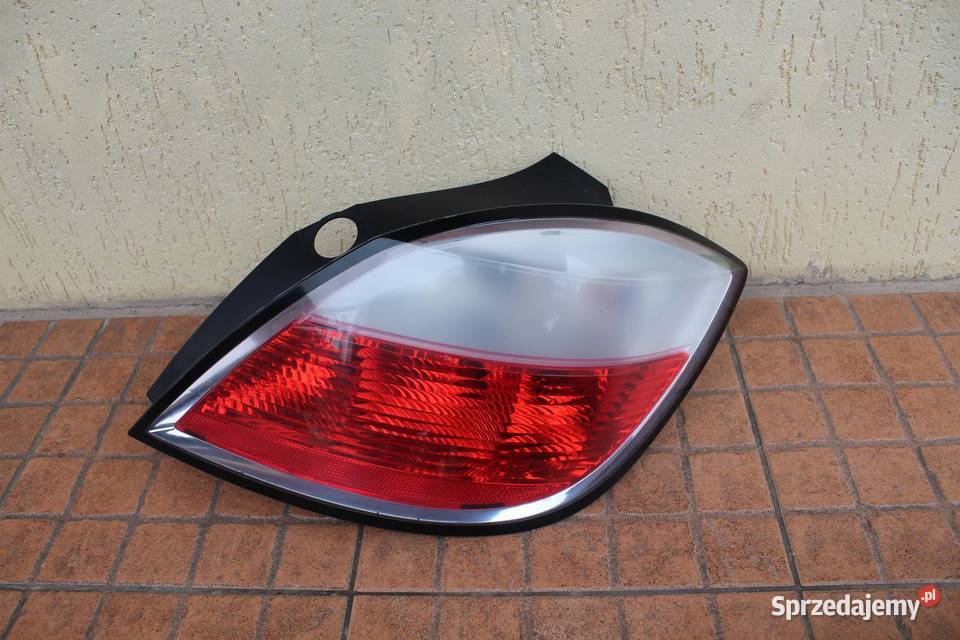 LAMPA PRAWY TYŁ TYLNA OPEL ASTRA H 24451837 Lampy przednie