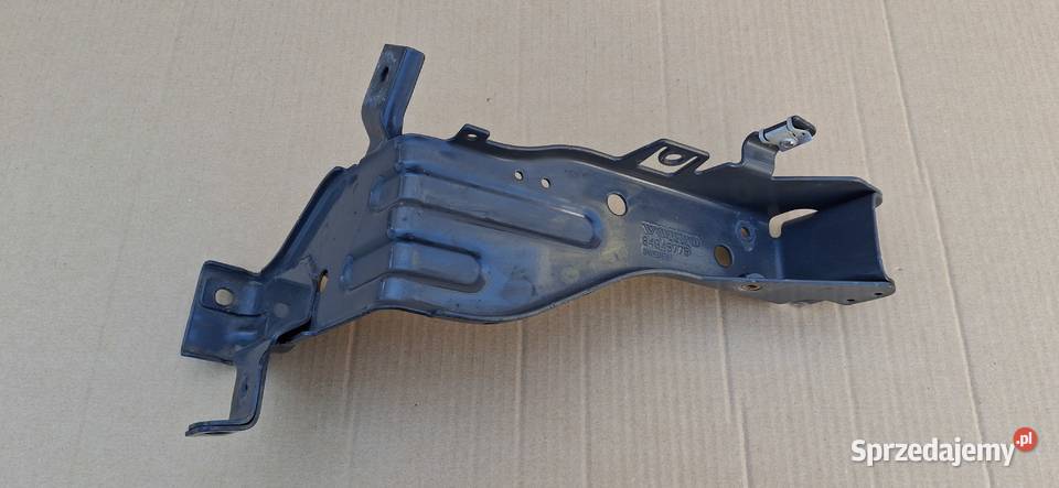 VOLVO FH4 UCHWYT WSPORNIK LAMPY HALOGENU LEWY Bieleń