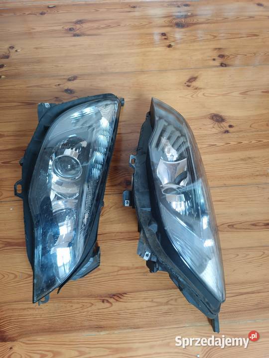 Lampy przednie xenony opel astra j osobowe Nisko