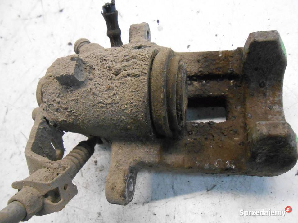 ZACISK HAMULCOWY LEWY TYŁ VW BORA 16 16V