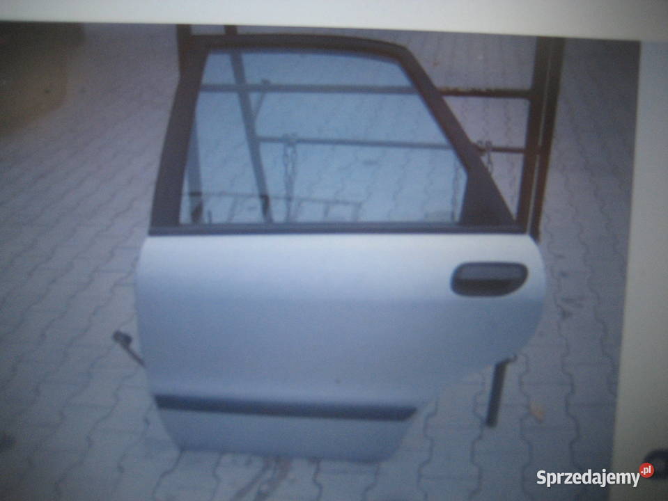 volvo s40 9600r drzwi tył lewe srebne kod wielkopolskie Rakoniewice sprzedam
