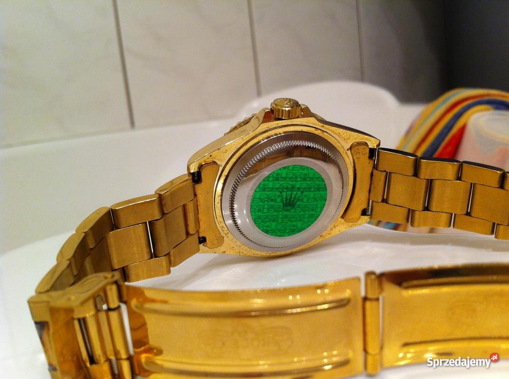 Złoty Rolex Submariner President Grawer z logiem