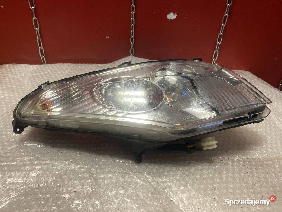 Peugeot Satelis 125 lampa reflektor przód B889 Poznań sprzedam